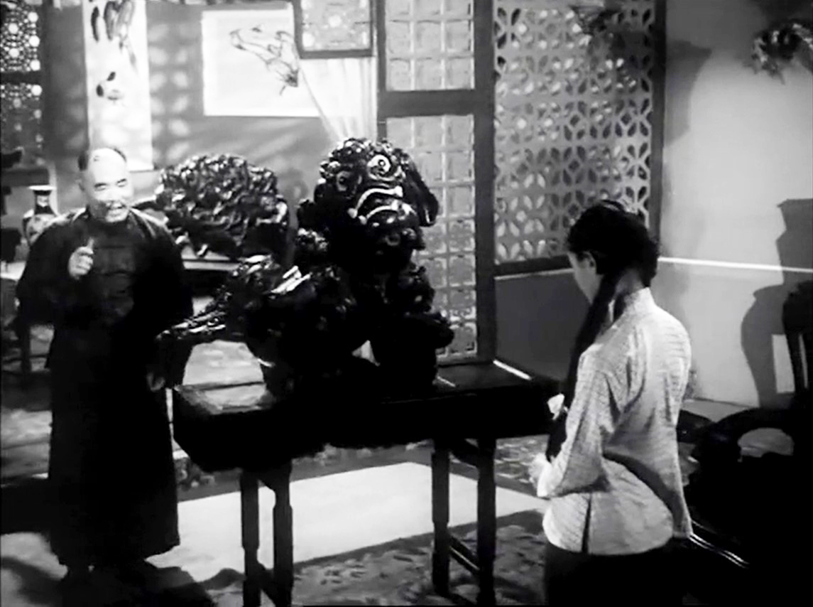 <p>A scene from 'Neel Akasher Nichey' (1959) portraying Aa Lang's sexual assault by a Chinese landlord</p>






































