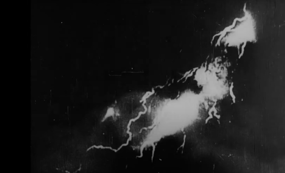 A shot from 'Dhruba' depicting lightning during a thunderstorm, incorporated in 'Apur Sansar'